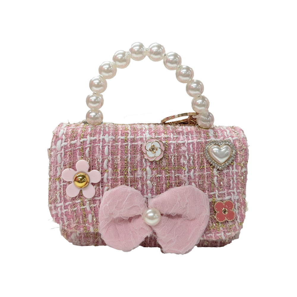 Pikkulaukku helmet ja rusetti